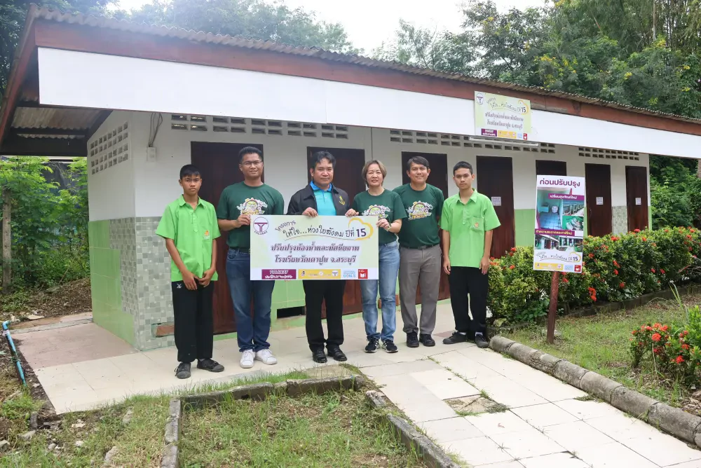 DMT advances the "Caring for Society Year 15" project (Phase 2) by renovating restrooms and landscaping at Wat Tao Poon School